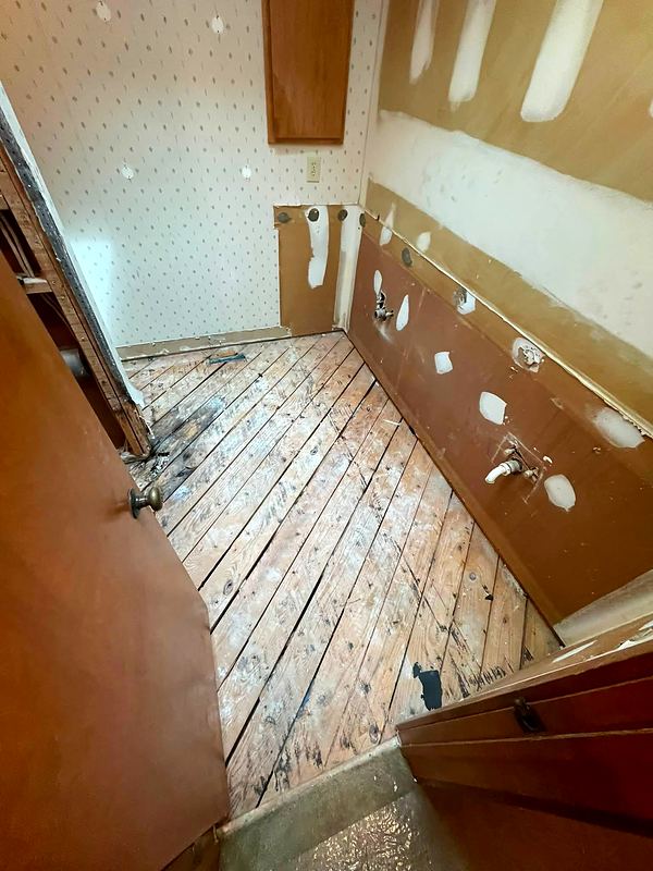 During: bathroom stripped to the subfloor